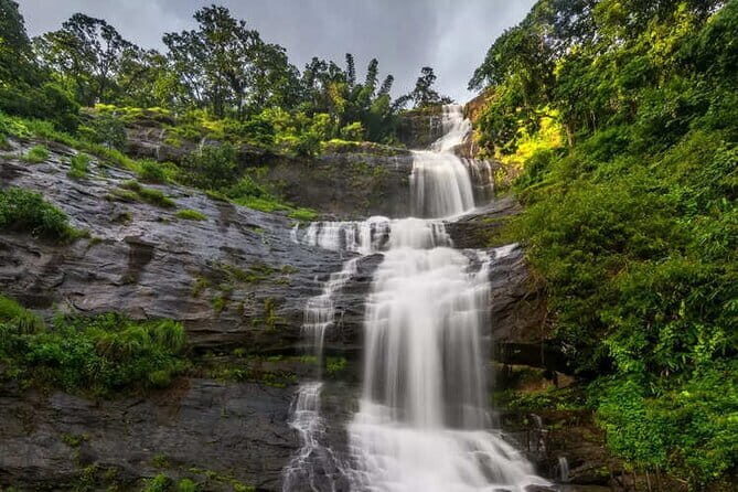 3 Nights Private Kerala Premium Package by Sanguine Holidays - Day 1: waterfalls near the highway and the bridge that points to the ranges