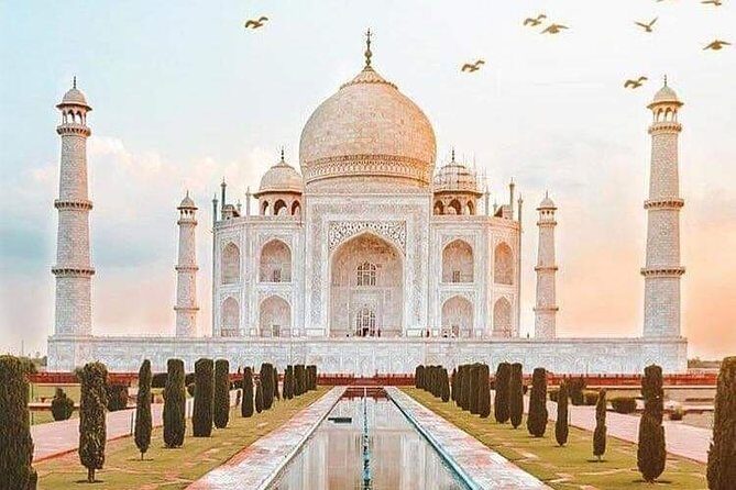 6 Days Golden Triangle Tour with Varanasi from Delhi - Varanasi at Dawn: Ganges Boat Ride, Monkey Temple, Vishwanath Temple, and Market Time