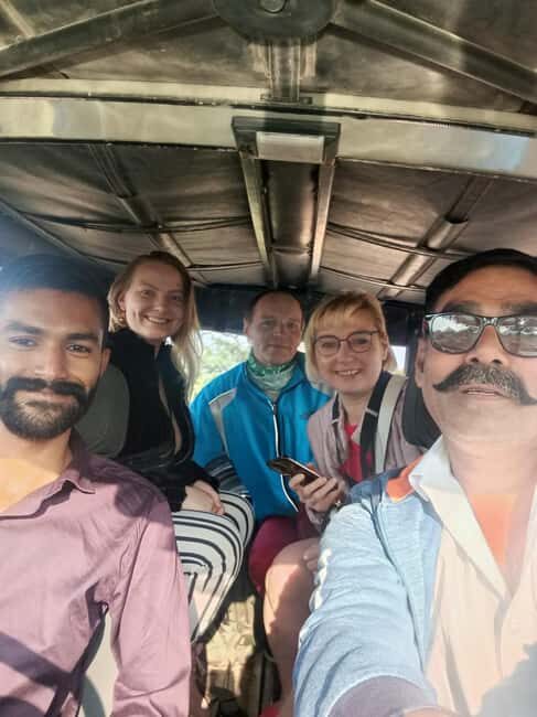7-Day Golden Triangle Tour with Ranthambore Tiger Safari - Day 6: Amer Fort, City Palace, Jantar Mantar, Jal Mahal, Hawa Mahal, and markets