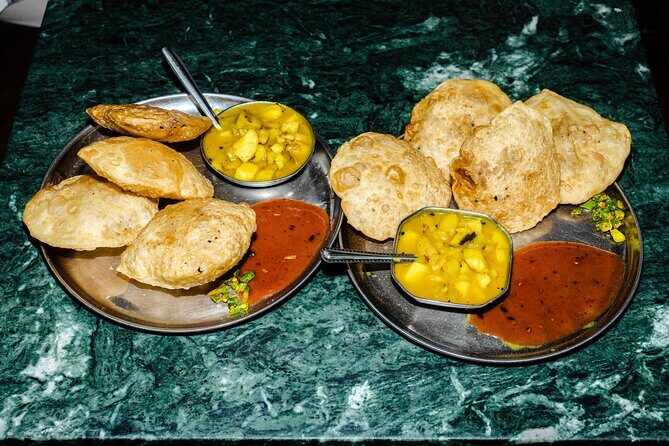 Bengali Nights Kolkata Food Tour with 13+ Tastings - Seafood Stop: Prawns in Chingri Coconut Style and Fish Steamed in Banana Leaf