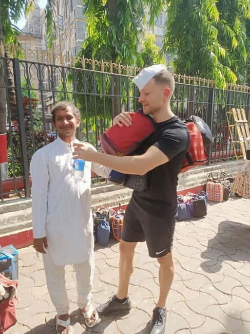 Best Combo Tour: Dabbawalas, Dhobi Ghat and Slum with Train - Dabbawalas: lunchbox delivery as real-city logistics