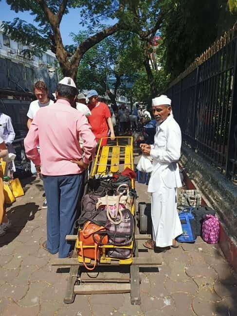 Best Combo Tour: Dabbawalas, Dhobi Ghat and Slum with Train - Churchgate meet-up: starting where Mumbai trains meet the city