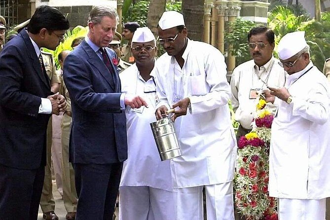 Dabbawala, Dhobi Ghat & Dharavi slum Tour with Local Train Ride - Dabbawala tribute stop: why the lunch delivery system is a big deal