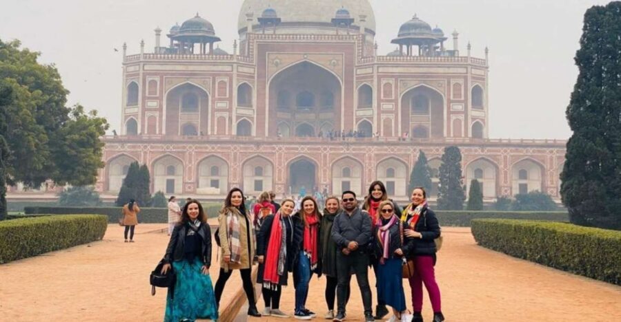 Delhi: Old & New Delhi Private Full Day or Half Day Tour - Entering Jama Masjid: the mosque that sets the tone