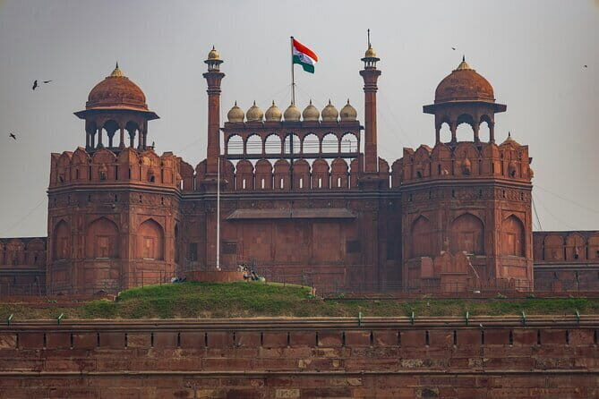 Exclusive Full-Day Guided Tour of Old and New Delhi - Red Fort drive-by: big Mughal architecture from the road