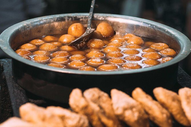 Food Walk tour of Old & New Delhi with a local guide - Meeting at Connaught Place and moving like a local