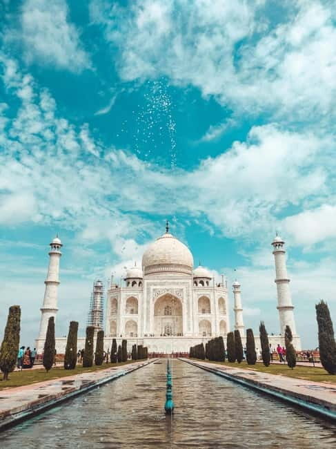 From Jaipur: Taj Mahal Same Day Guided Tour by Car - Arriving at the Taj Mahal: Timing, Tickets, and Security