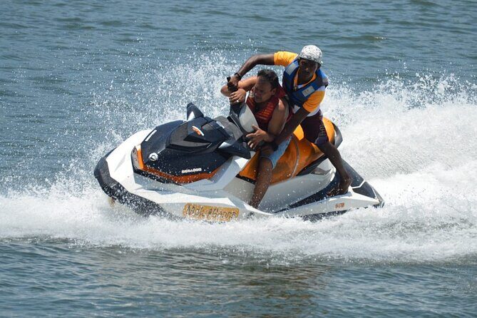 Jet Skiing in Bentota - Bentota River jet ski action: tide, waves, and sea spray