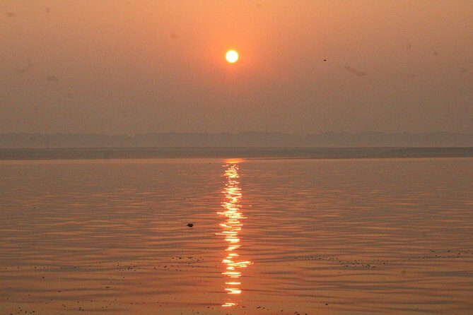 Morning Boat Tour followed by a short heritage walking tour in VARANASI - Banaras ghats walk: temples, a South Indian stop, and cremation views