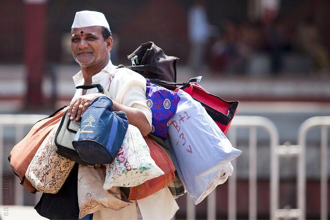 Morning Life of Mumbai's Dabbawalas and Dhobis Tour - Churchgate Station: where lunch boxes get sorted for the day