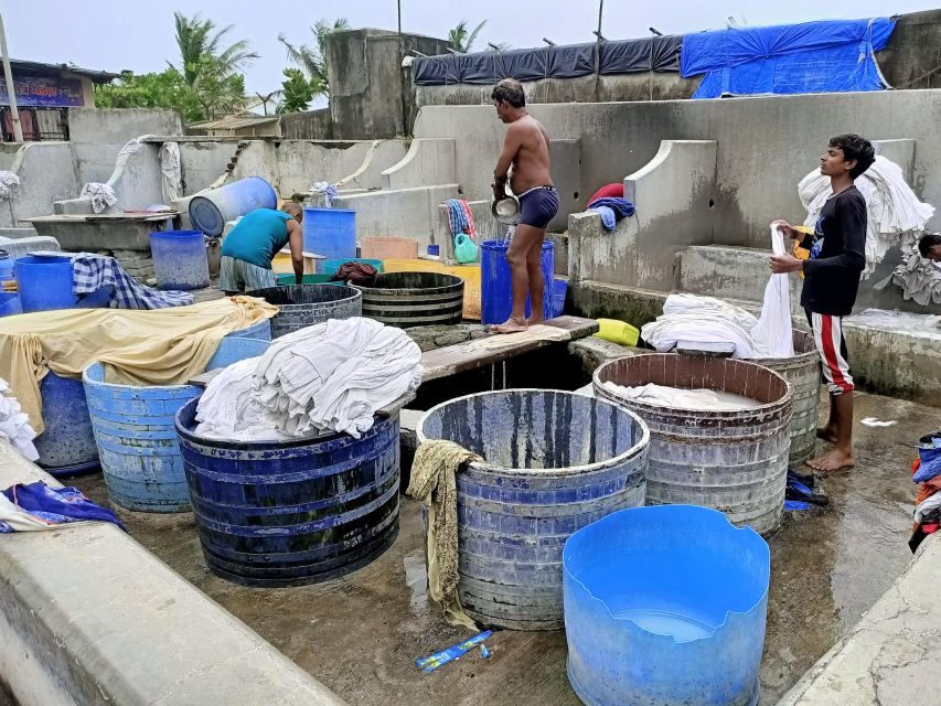 Mumbai: Dharavi Slum and Dhobi Ghat Tour with Train Ride - Dhobi Ghat: Asia’s open-air laundry and how to “see” it right