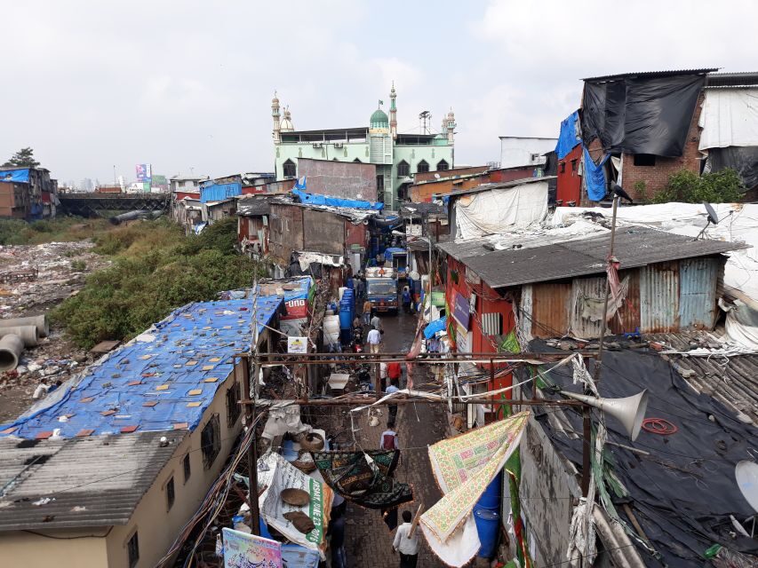 Mumbai: Dharavi Slum Walking Tour with Local Slum Dweller - Pottery workshop option: throwing clay with a local potter