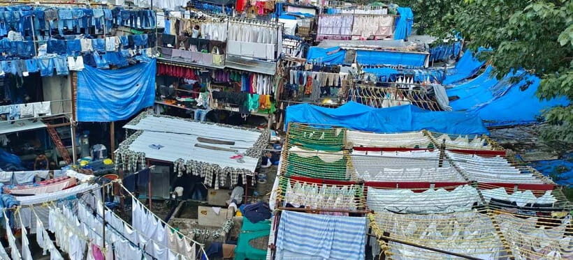 Mumbai: Private Dhobi Ghat Laundry & Slum Tour with Pickup - Choosing transport: hotel pickup plus possible local train time