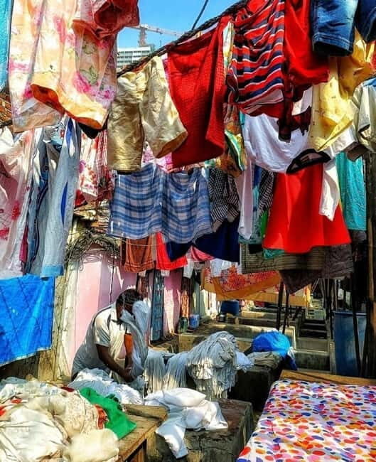 Mumbai: Private Dhobi Ghat Laundry & Slum Tour with Pickup - Dharavi with a local guide: homes, work, and community life