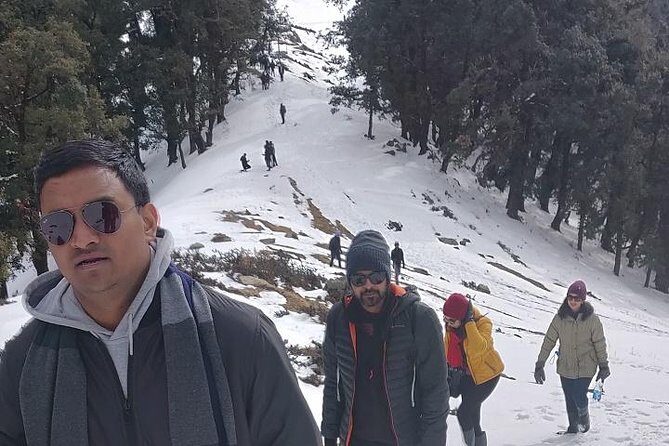 Nag Tibba Snow Trek - Camping setup: tents, sleeping bags, mats, plus a proper camp mood