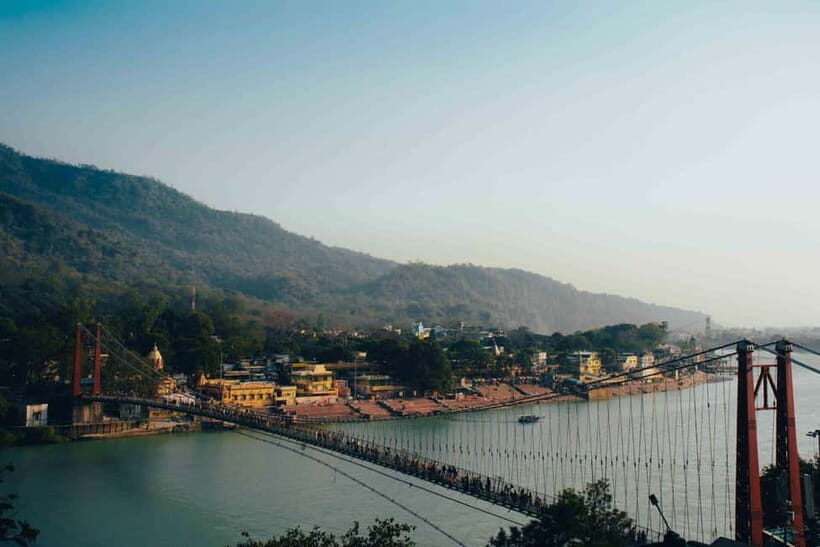 Rishikesh Full Day Guided Sightseeing Tour with Ganga Aarti - Sivananda Ashram: wellness, books, and a quieter pace