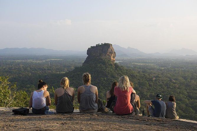 Sigiriya Lion Rock & Dambulla Cave Temple (Full Package) - Dambulla Cave Temple: Buddha faces inside cool stone