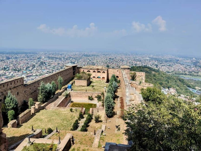 Srinagar: Private Old City and Mughal Gardens Guided Tour - The Old Bazaar and copper utensil shops: where the city feels real