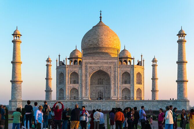 Sunrise Taj Mahal Tour From Delhi - Entering the Taj Mahal complex with a guide
