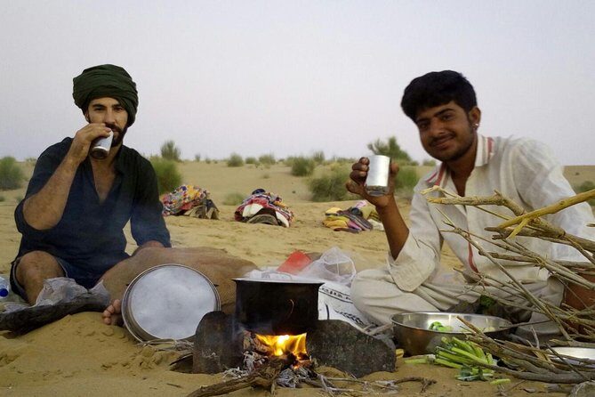 The Silent Dunes Experience - Without Camel Overnight Tour - Sunset Moment: Campfire Warmth and Dinner Cooked in Front of You