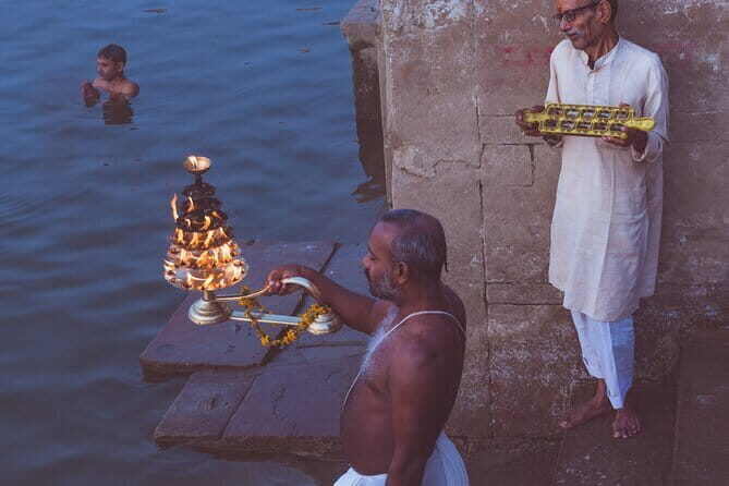 Varanasi at Dawn: Boat Ride & Storytelling Walk Through Old City - Old-city footwork: stepwell, akhada, and reading symbols on the street