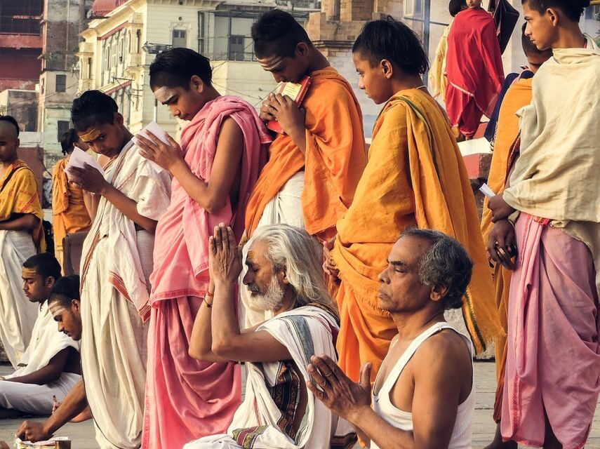 Varanasi: Morning Tour with Yoga Session and Boat Ride - The 1-hour Ganges boat ride: views, rituals, and possible weather swaps