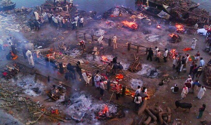 Varanasi Mysteries Walk: A Journey through Life and Death - Manikarnika Ghat at dusk: why the burning ghat matters